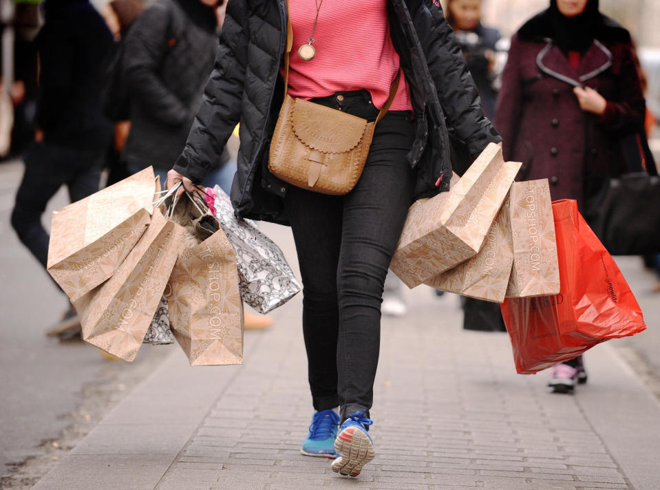 EMBARGOED TO 0001 TUESDAY FEBRUARY 9 File photo dated 05/11/19 of a person carrying shopping. Retail sales slid in January as the latest national lockdown hammered shops across the UK, according to new figures. Issue date: Tuesday February 9, 2021.