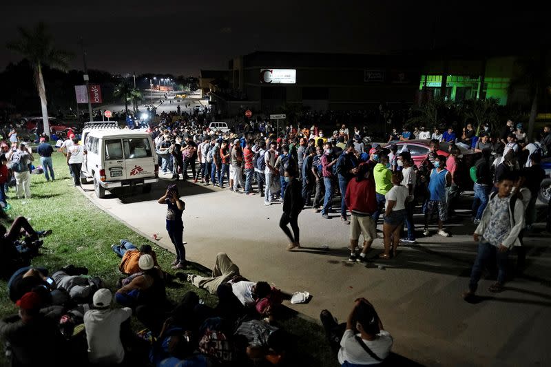 Hondurans take part in a new caravan of migrants, set to head to the United States, in San Pedro Sula