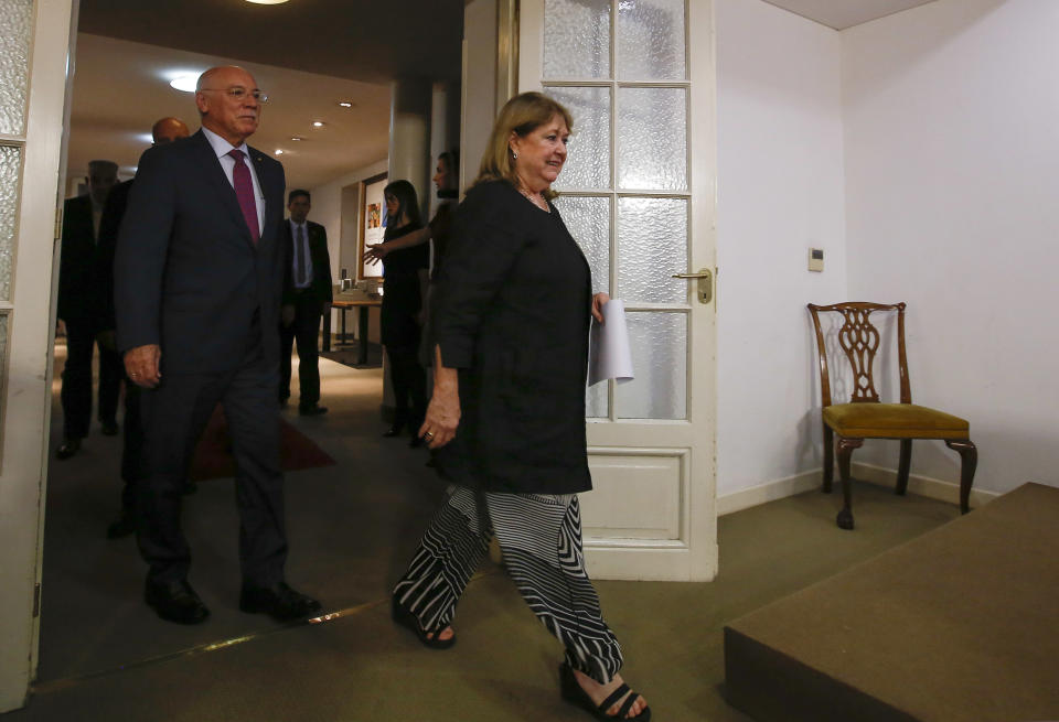 Argentina's Foreign Minister, Susana Malcorra, center, and Paraguay's Foreign Minister Eladio Loizaga arrive to a press conference in Buenos Aires, Argentina, Saturday, April 1, 2017. The South American trade bloc called an emergency meeting of Mercosur nations' foreign ministers to discuss the Venezuelan political crisis which suspended Venezuela in December. (AP Photo/Agustin Marcarian)