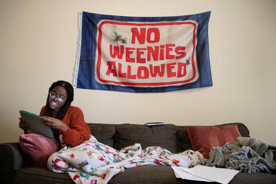 Brooklyn Johnson does homework on Sunday, Feb. 27, 2022, in her dorm at Rhodes College. Johnson used to do homework in the library at school, but after recently receiving surgery, it is now too far of a walk. 