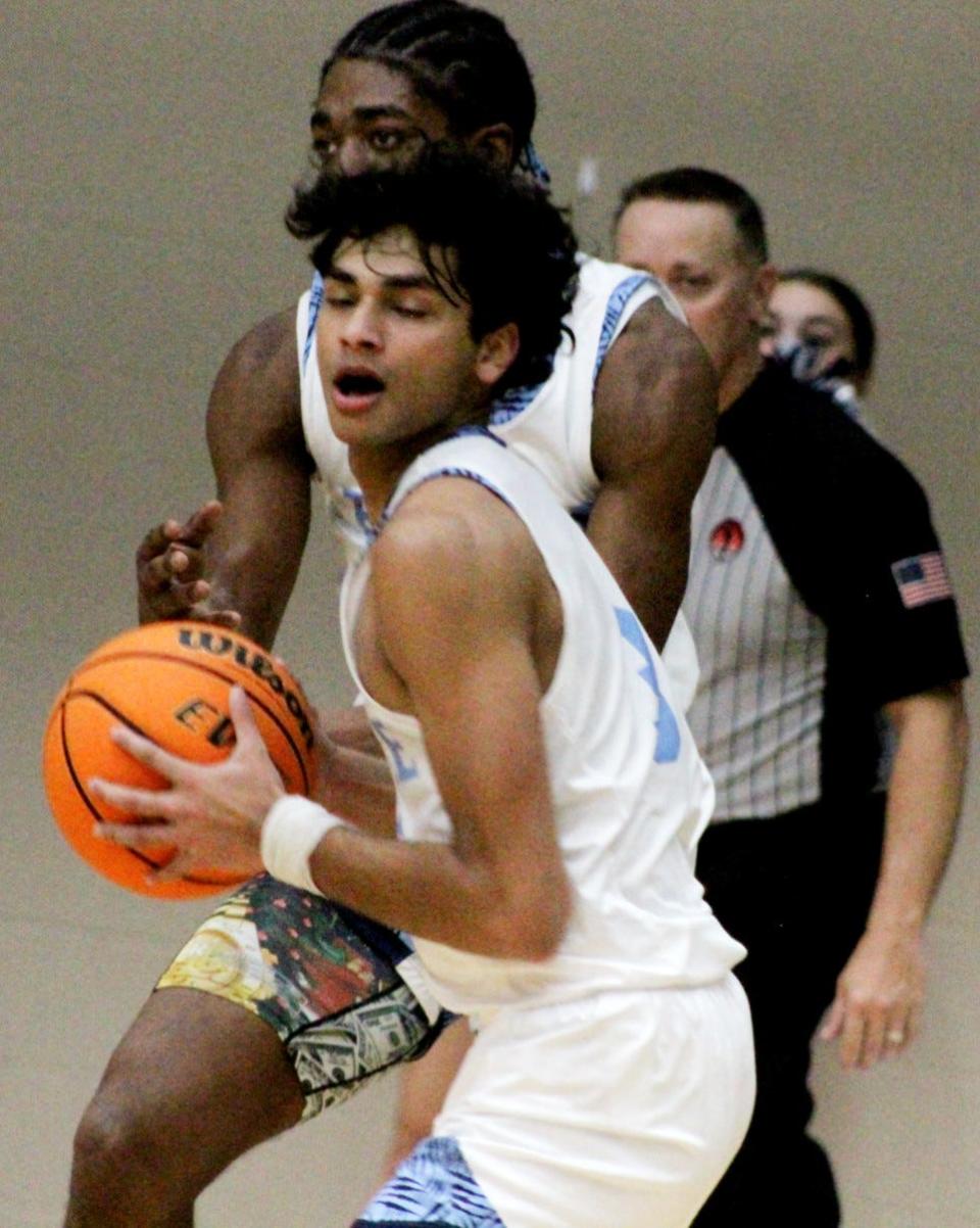 Bartlesville High senior guard Aadhi Ayyappan displays the intensity of the action on Dec. 2, 2022, when the Bruins defeated Sapulpa High, 85-55, in Bartlesville's season opener.