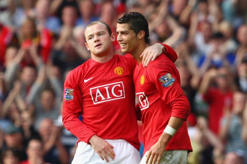 Wayne Rooney and Cristiano Ronaldo in action for Manchester United in 2008