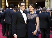 Actor Johnny Knoxville and his wife Naomi Nelson arrive on the red carpet at the 86th Academy Awards in Hollywood, California March 2, 2014. REUTERS/Mike Blake (UNITED STATES TAGS: ENTERTAINMENT) (OSCARS-ARRIVALS)