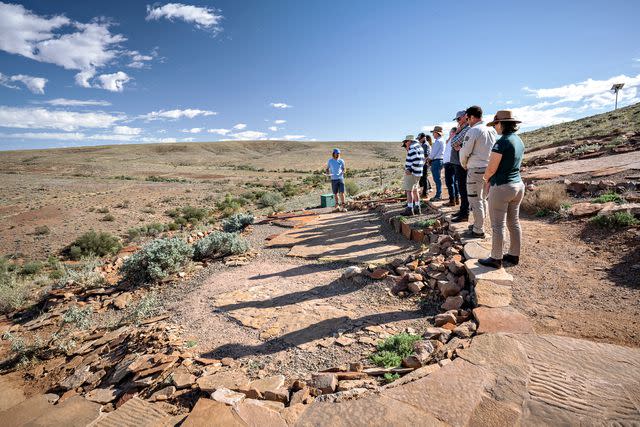 <p>COURTESY OF DEPARTMENT FOR ENVIRONMENT AND WATER, SOUTH AUSTRALIA</p> A tour of ediacaran-period fossils in Nilpena Ediacara National Park, in the Flinders Range.