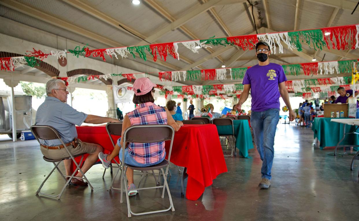 People gather at the Fiestas Patrias celebration hosted by the San Angelo Southside Lions Club at El Paseo de Santa Angela on Saturday, Sept. 18, 2021.