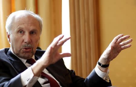 European Central Bank Governing Council member and chief of Austria's central bank Ewald Nowotny gestures during an interview with Reuters in Vienna, Austria, May 8, 2015. REUTERS/Leonhard Foeger