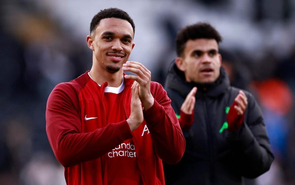 Trent Alexander-Arnold and Luis Diaz clap the travelling Liverpool fans