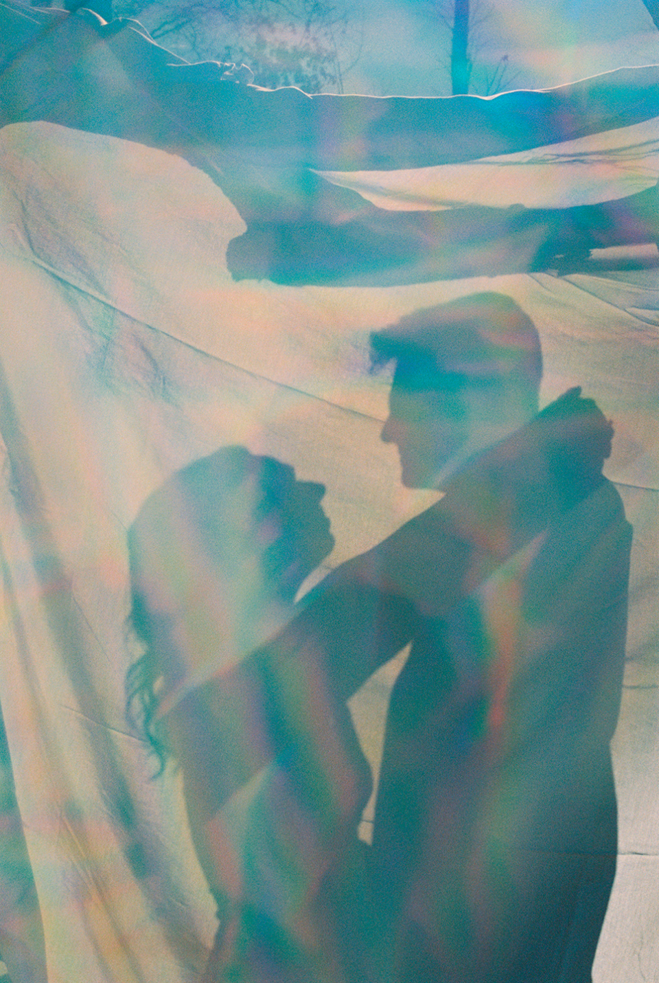 shadows of man and woman embracing