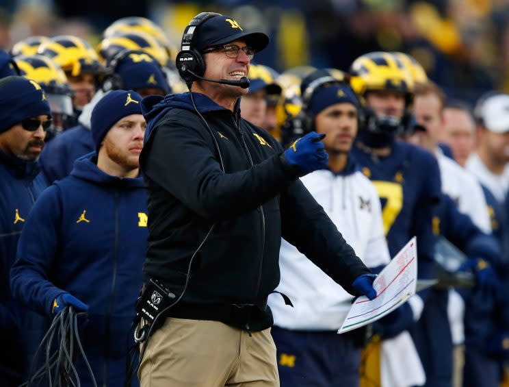 Jim Harbaugh plans to take Michigan overseas annually. (Getty)