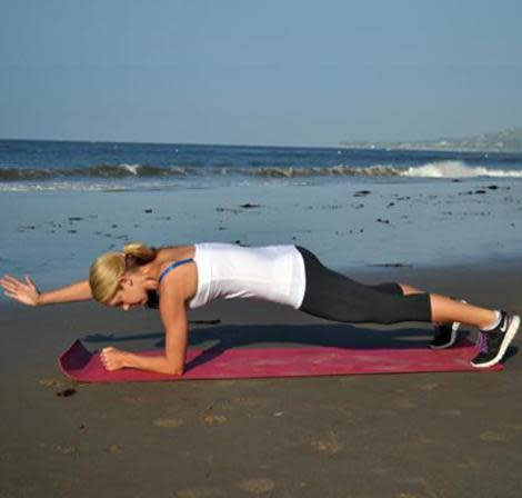 Plank with arm raise