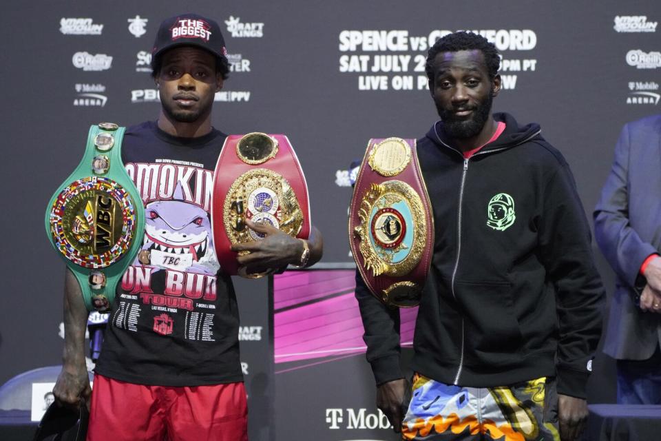 Errol Spence Jr., left, and Terence Crawford pose during a news conference Thursday in Las Vegas.