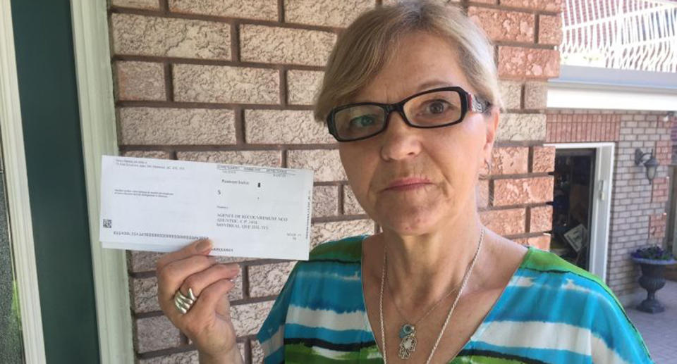 Stacy Majchrowski was stunned to receive a 20-year-old bylaw ticket for an off-leash dog that wasn’t hers. Source: CBC News