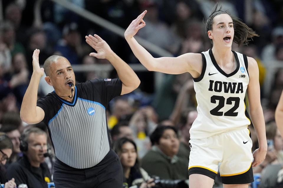 Iowa guard Caitlin Clark (22) motions after hitting a three-point shot against Colorado during the third quarter of a Sweet Sixteen round college basketball game during the NCAA Tournament, Saturday, March 30, 2024, in Albany, N.Y. (AP Photo/Mary Altaffer)