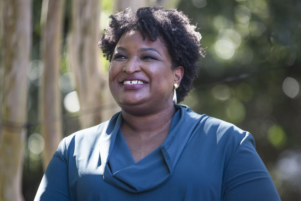 NORFOLK, VA - OCTOBER 17: Former US Representative and voting rights activist Stacey Abrams is introduced before speaking at a Souls to the Polls rally supporting Former Virginia Gov. Terry McAuliffe on October 17, 2021 in Norfolk, Virginia. Virginia will hold gubernatorial and local elections on November 2. (Photo by Zach Gibson/Getty Images)