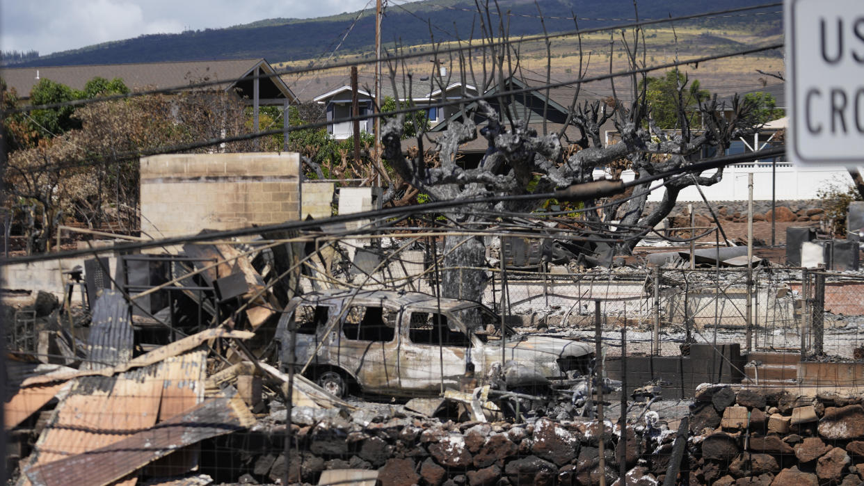 Destruction is seen in a neighborhood on Aug. 13, 2023, in Lahaina, Hawaii, following a deadly wildfire that caused heavy damage days earlier. / Credit: AP Photo/Rick Bowmer
