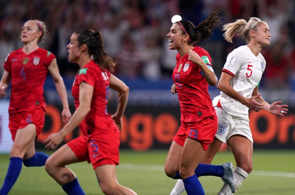 United States players celebrate as Steph Houghton, right, reacts to her penalty being saved in the 2019 World Cup semi-final (John Walton/PA) (PA Archive)