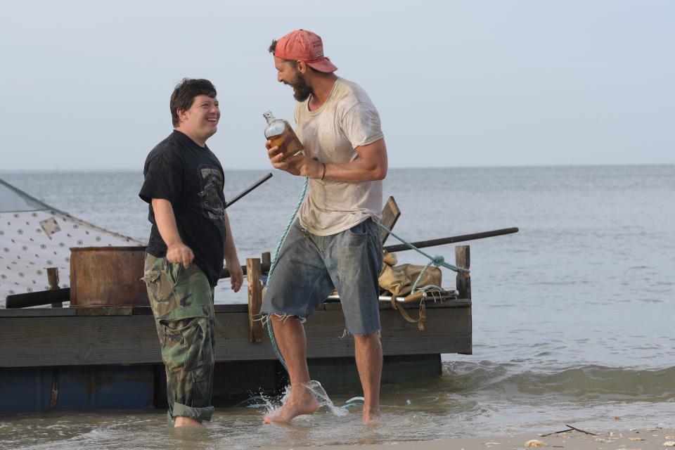 Zak (Zack Gottsagen, left) and Tyler (Shia LaBeouf) become fast friends traversing the North Carolina coast in "The Peanut Butter Falcon."