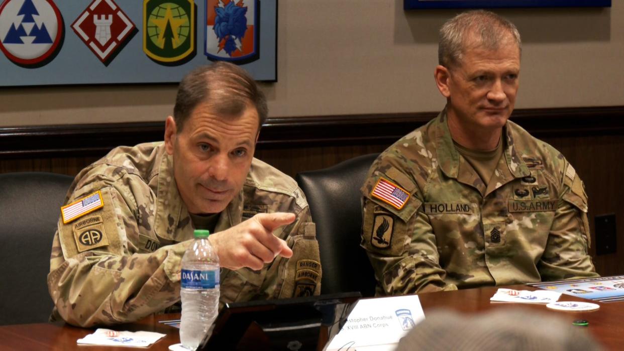 Lt. Gen. Christopher Donahue, commander of teh 18th Airborne Corps and Fort Bragg, fields media questions during a March 28, 2023, round table dicussion about renaming Fort Bragg to Fort Liberety, while Command Sgt. Maj. T.J. Holland looks on.