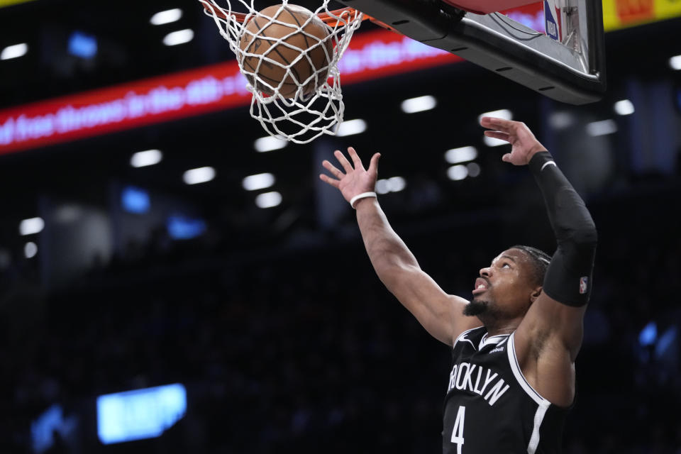 Brooklyn Nets guard Dennis Smith Jr. dunks during the second half of the team's NBA basketball game against the New York Knicks, Tuesday, Jan. 23, 2024, in New York. (AP Photo/Mary Altaffer)