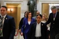 House Speaker Pelosi speaks to news reporters ahead of a vote on relief for the coronavirus (COVID-19) disease on Capitol Hill in Washington