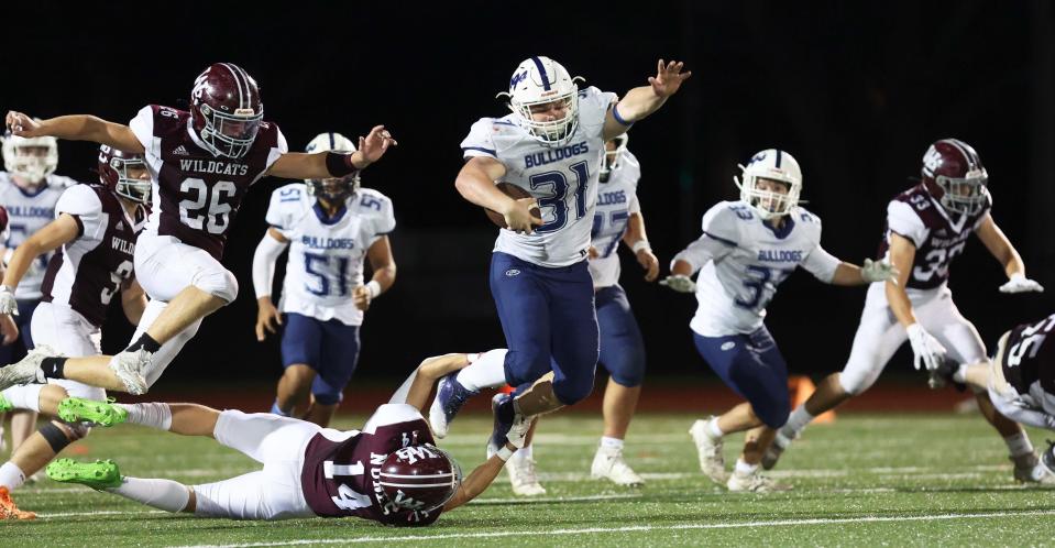 Rockland running back Joe Earner carries the football during a game versus West Bridgewater on Friday, Sept. 22, 2023.