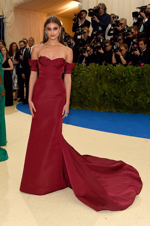 The Victoria's Secret model went for a classic, deep red Carolina Herrera gown.