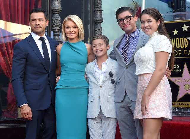 <p>Axelle/Bauer-Griffin/FilmMagic</p> Kelly Ripa, Mark Consuelos, Lola Consuelos, Michael Consuelos and Joaquin Consuelos attend the ceremony honoring Kelly Ripa with a star on the Hollywood Walk of Fame on October 12, 2015.