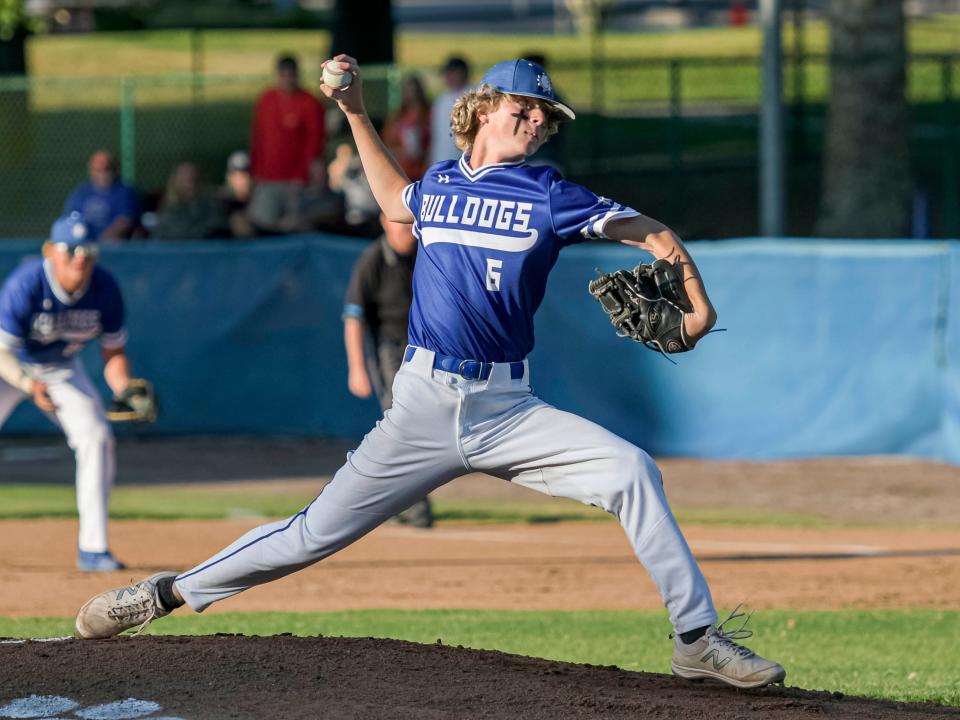 MDCA pitcher Cooper Chapman (6) works during Wednesday's Class 2A-Region 2 quarterfinal game against Lakeland Victory Christian Academy. [PAUL RYAN / CORRESPONDENT]