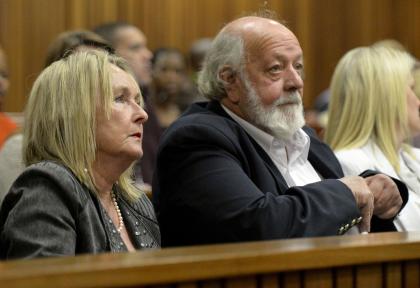 Parents of the late Reeva Steenkamp, June, left, and Barry Steenkamp, right, attend the murder trial Friday. (AP)