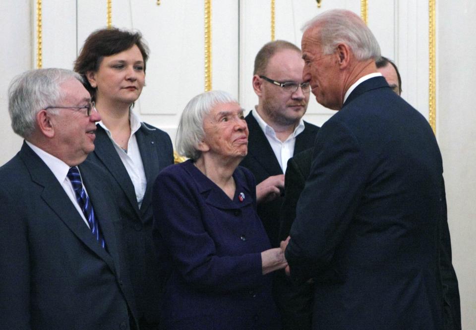 FILE In this file photo taken on Thursday, March 10, 2011, Vice President of the United States Joe Biden, right, speaks to Russian human right's activist Lyudmila Alexeyeva, second right, as he meets with Russian Civil Society leaders in Moscow, Russia. Alexeyeva, who was forced into exile by Soviet authorities after founding Russia's oldest human rights organization in 1976, passed away in a Moscow hospital Friday, Dec. 7, 2018 at age 91. (AP Photo/Alexander Zemlianichenko)