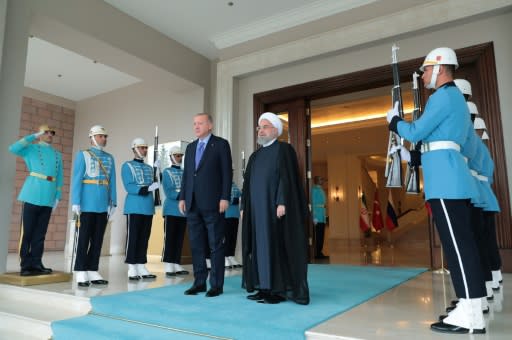 Erdogan, left, welcomes Rouhani ahead of three-way summit with Putin. Iran and Russia have been staunch supporters of Syrian President Bashar al-Assad, while Turkey has called for his ouster