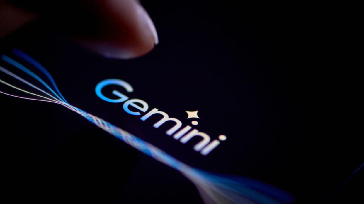  Gemini logo in the center of an electronic screen being selected. 