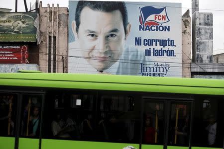 A billboard of presidential candidate Jimmy Morales of the National Convergence Front party is seen in Guatemala City, October 24, 2015. REUTERS/Jose Cabezas