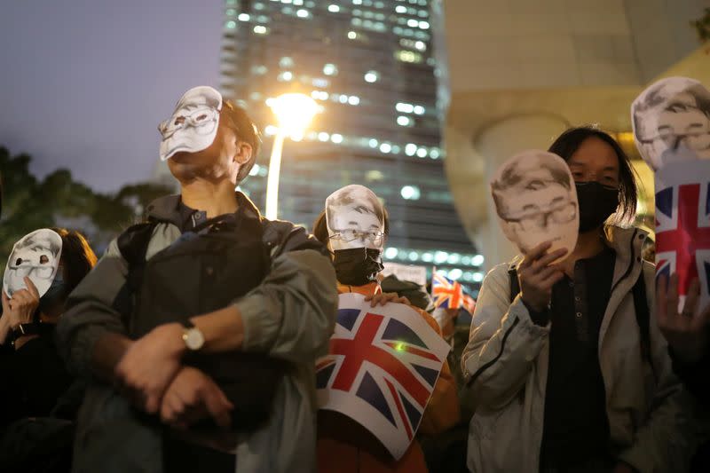 Protesters attend a rally outside the British Consulate General in Hong Kong