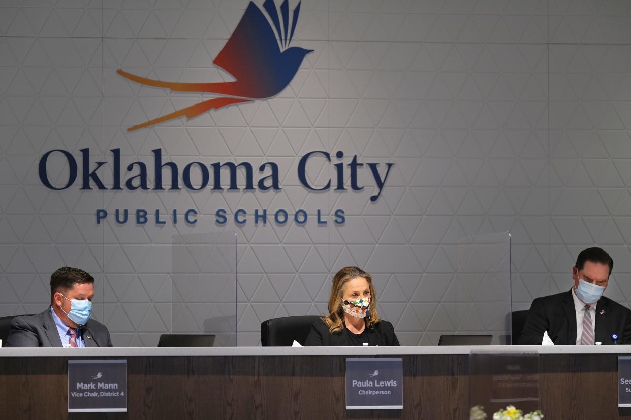 Mark Mann, Paula Lewis and Sean McDaniel are shown in 2021 during the Oklahoma City Public School Board meeting.