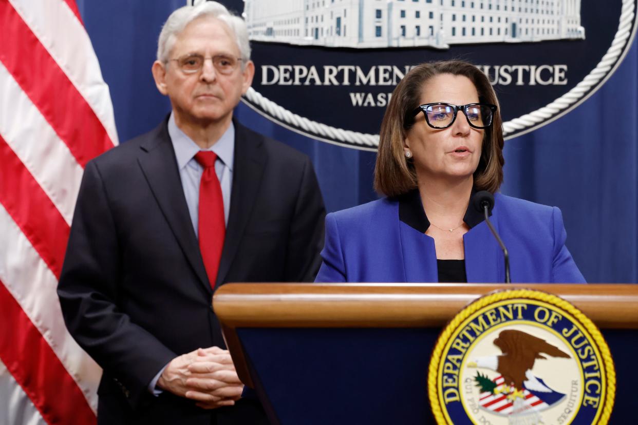 Deputy Attorney General Lisa Monaco speaks alongside Attorney General Merrick Garland during a news conference at the Department of Justice Building on March 21, 2024 in Washington, DC. During the news conference Garland and DOJ officials announced the department would be taking action against Apple, claiming that the tech company has an illegal monopoly on smartphones.