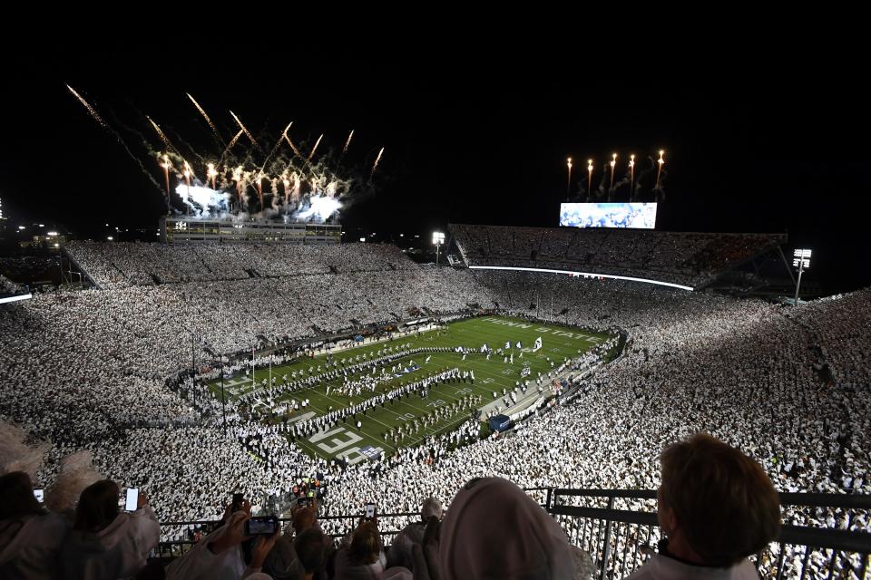 Penn State takes the field for an NCAA college football game against Minnesota amidst a "Whiteout" crowd at Beaver Stadium, Saturday, Oct. 22, 2022, in State College, Pa. (AP Photo/Barry Reeger)