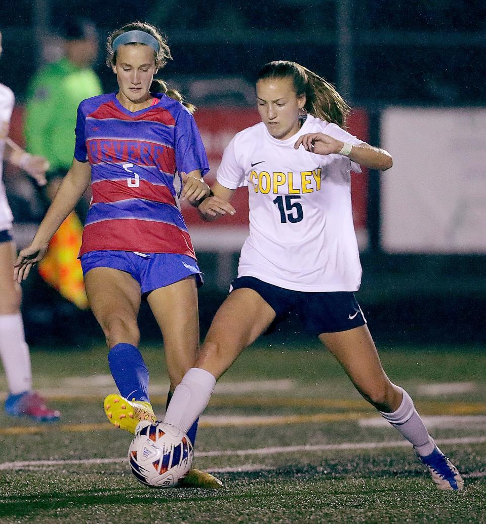 Copley's Kate Young steals a pass in from of Revere's Natasha Pokrajac on Tuesday, Sept. 26, 2022 in Bath Township.