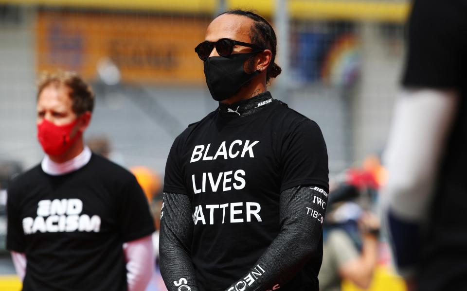 Lewis Hamilton of Great Britain and Mercedes GP is seen on the grid wearing a 'black lives matter' t-shirt prior to the Formula One Grand Prix of Styria at Red Bull Ring on July 12, 2020 in Spielberg, Austria. - GETTY IMAGES