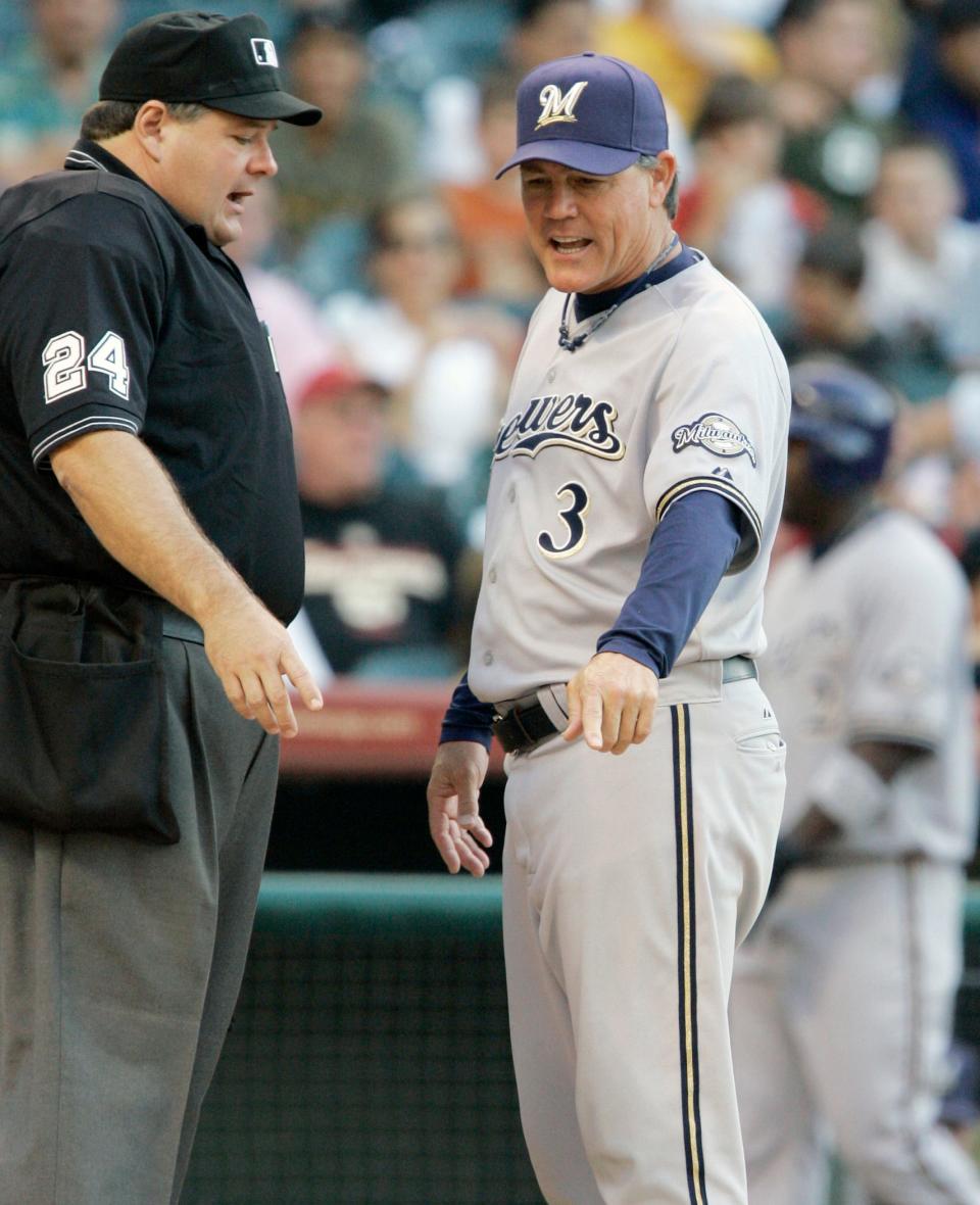 Milwaukee Brewers manager Ned Yost (3) argues with home plate umpire Jerry Layne (24) in the fourth inning of a baseball game against the Houston Astros, Saturday, May 3, 2008 in Houston.