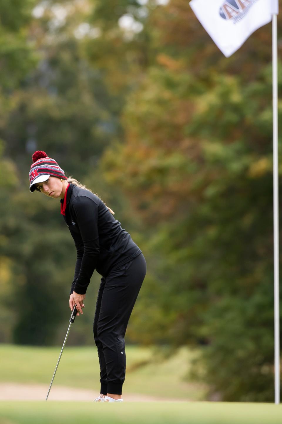 Hickory's Ava Liburdi prepares to putt at hole No. 18 during the PIAA Class 2A girls team golf championship at Penn State University's White Course Wednesday in State College.