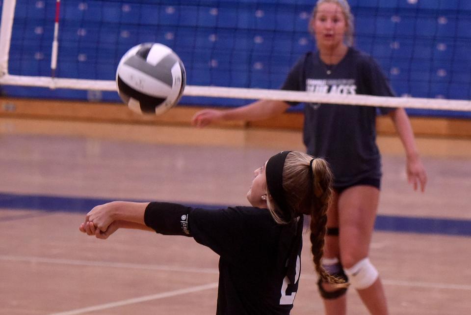 Johnstown's Makenna Rivard receives a Granville serve during summer scrimmages in the Blue Aces gym on Thursday, July 21, 2022.