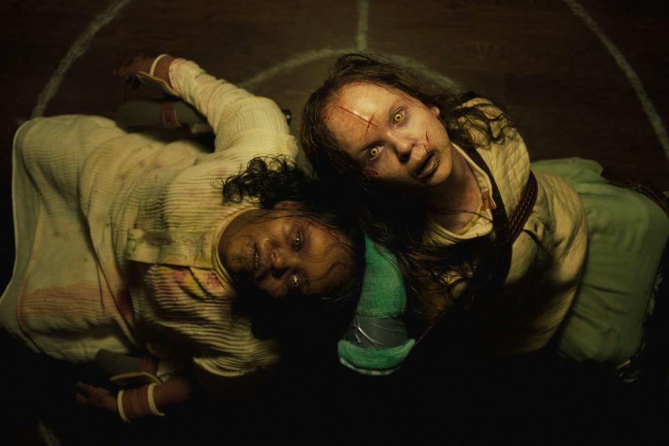 <p>Universal Pictures</p> Angela Fielding (Lidya Jewett) and Katherine (Olivia Marcum) in The Exorcist: Believer