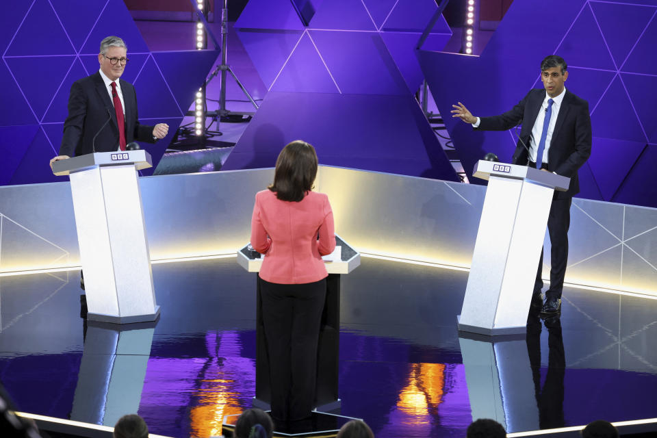 FILE - Britain's Prime Minister Rishi Sunak and opposition Labour Party leader Keir Starmer, left, take part in the BBC's Prime Ministerial Debate, in Nottingham, England, Wednesday June 26, 2024. The United Kingdom will hold its first national election in almost five years on Thursday, with opinion polls suggesting that Prime Minister Rishi Sunak’s Conservative Party will be punished for failing to deliver on promises made during 14 years in power. (Phil Noble/Pool via AP, File)