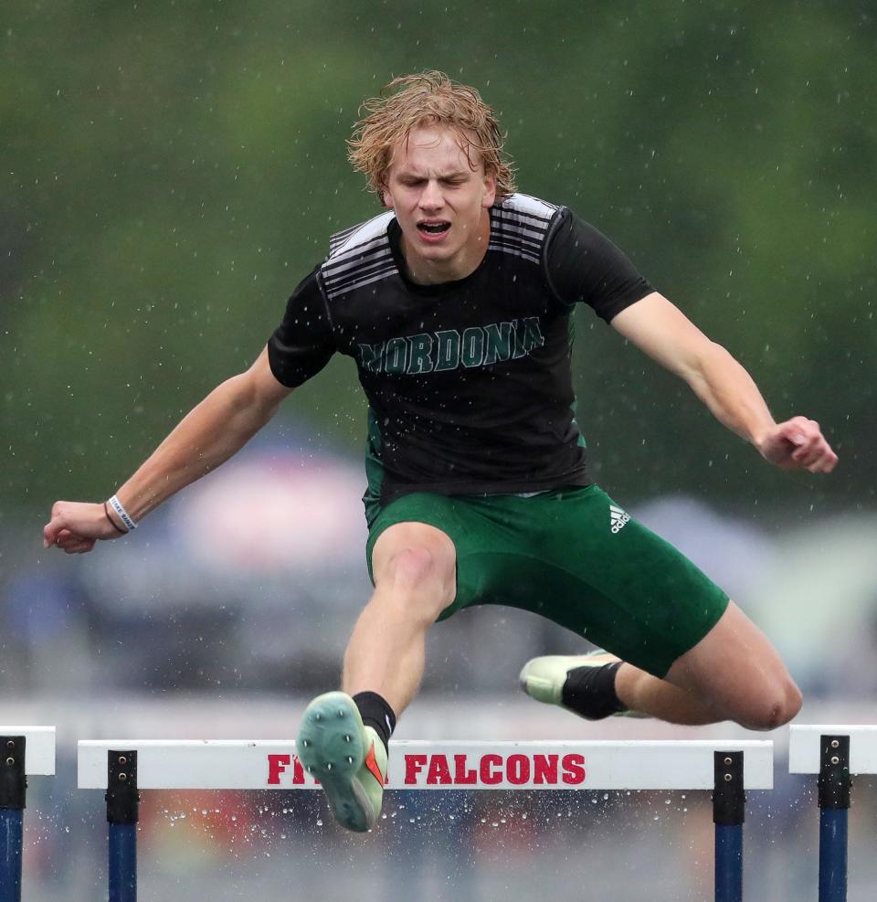 Nordonia's Matthew Hayes clears the final hurdle in the boys 300 meter hurdles during the Division I regional track and field meet at Austintown Fitch High School on Friday.