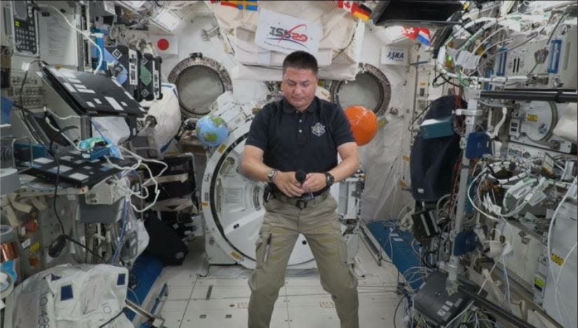 Astronaut and CSU grad Dr. Kjell Lindgren floats during an interview with the Coloradoan conducted from the International Space Station on Wednesday.
