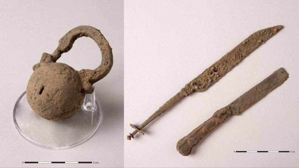 Some of the artifacts found at the castle including a padlock (left) and a pair of knives (right)