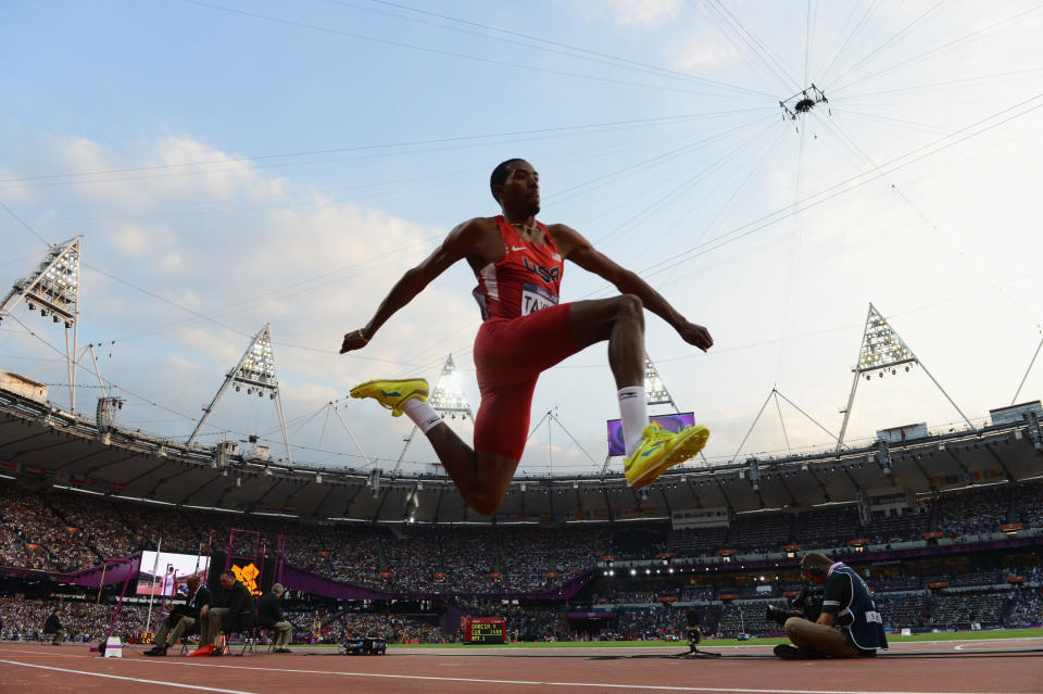 LONDON, ENGLAND - AUGUST 09: Christian Taylor of the United States competes during the Men's Triple Jump Final on Day 13 of the London 2012 Olympic Games at Olympic Stadium on August 9, 2012 in London, England. (Photo by Stu Forster/Getty Images)