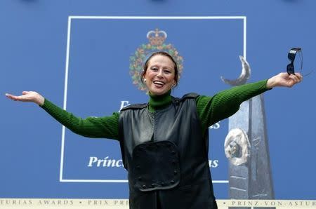 Russian dancer Maya Plisetskaya poses for photographers after arriving to Oviedo, northern Spain, in this file October 19, 2005 photo. REUTERS/Alonso Gonzalez