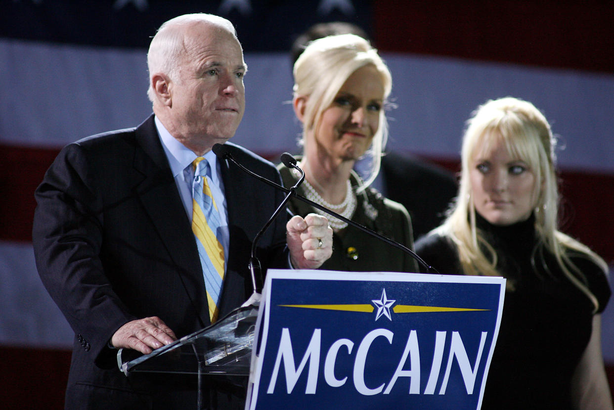 MIAMI - JANUARY 29:  Republican presidential hopeful Sen. John McCain (R-AZ) speaks as his wife Cindy (C) and daughter Megan (R) look on during a post primary campaign rally at the Hilton hotel January 29, 2008 in Miami, Florida. After winning in South Carolina, McCain is the winner of the Florida Republican primary, followed by former Massachusetts Gov. Mitt Romney with former New York City mayor Rudy Giuliani running in third.  (Photo by Marc Serota/Getty Images)